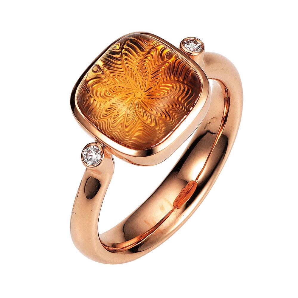 Gold Ring mit gelbem Edelstein auf guillochierter Fläche mit Diamanten