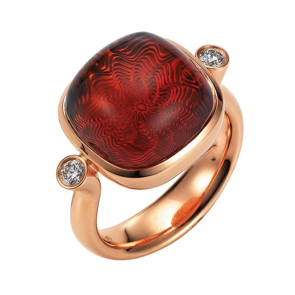 Gold Ring mit rotem Edelstein auf guillochierter Fläche mit Diamanten