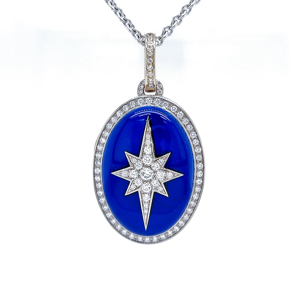 Medaillon aus Weißgold in Electric Blue Farbe und ovaler Form verziert mit einem Kranz aus Brillanten und einem Brillanten-Stern