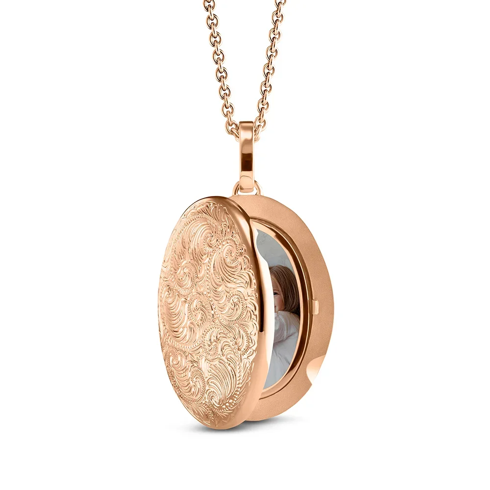 Oval shaped locket necklace in rose gold with floral decoration