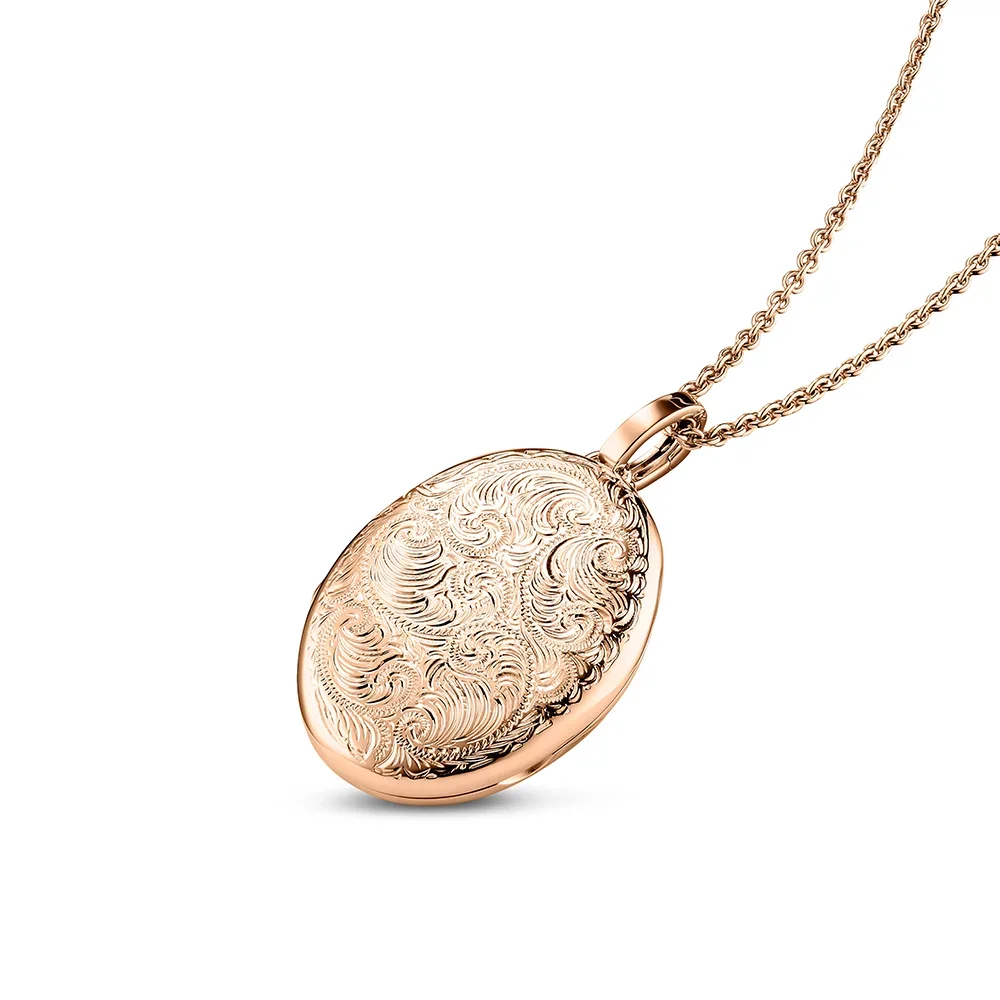 Oval shaped locket necklace in rose gold with floral decoration