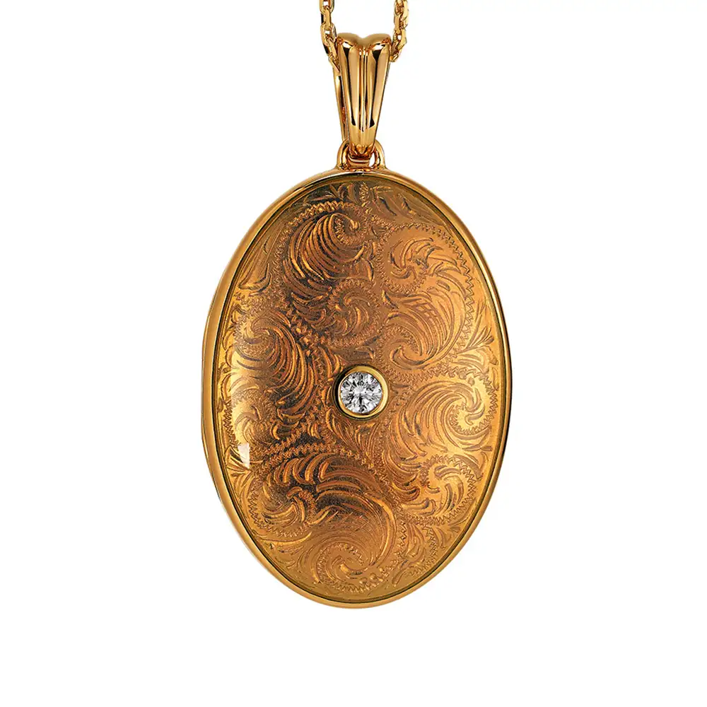 Oval shaped locket necklace in yellow gold with white lacquering, floral decoration and a diamond in the centre