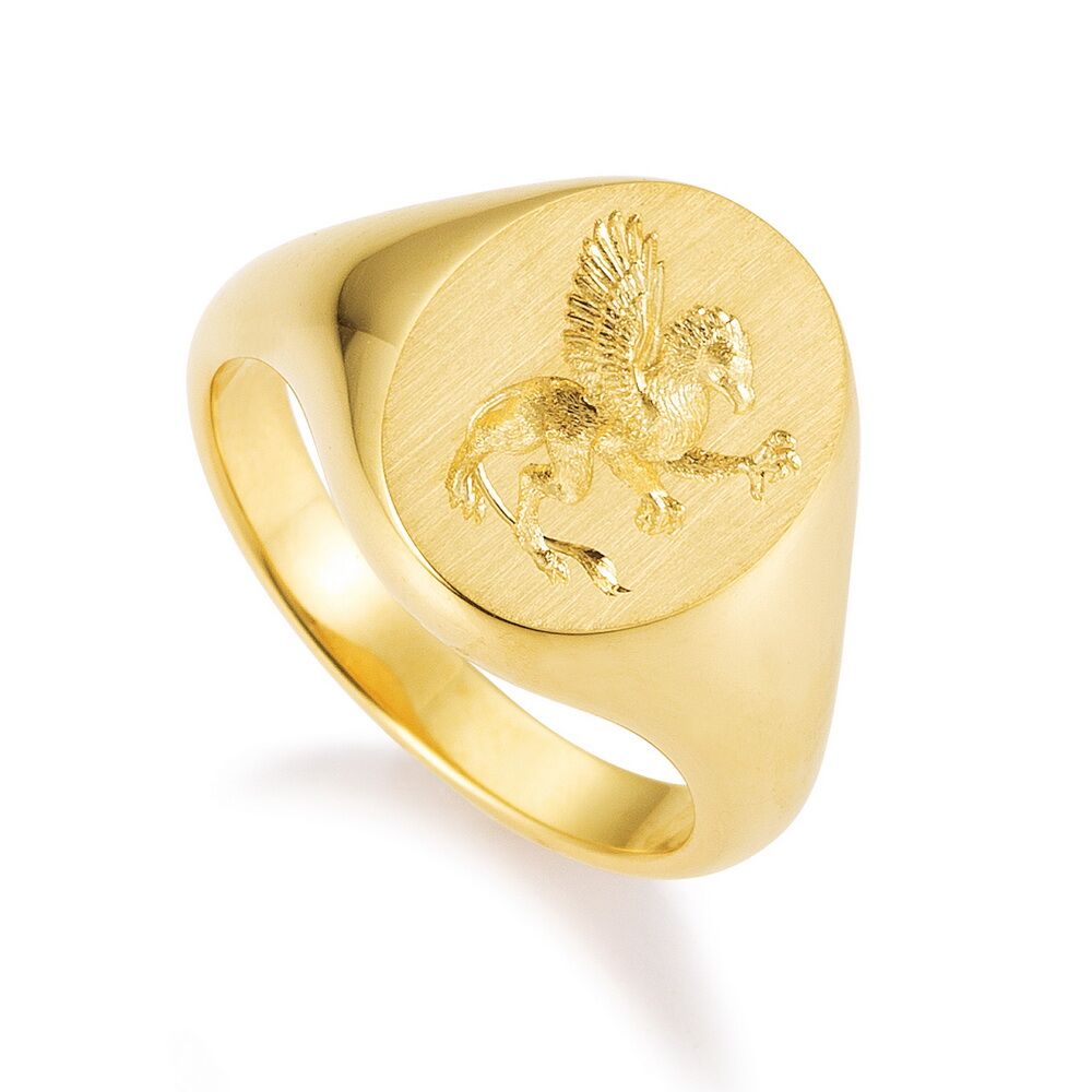 Oval signet ring in 18k yellow gold with hand engraving of a griffin