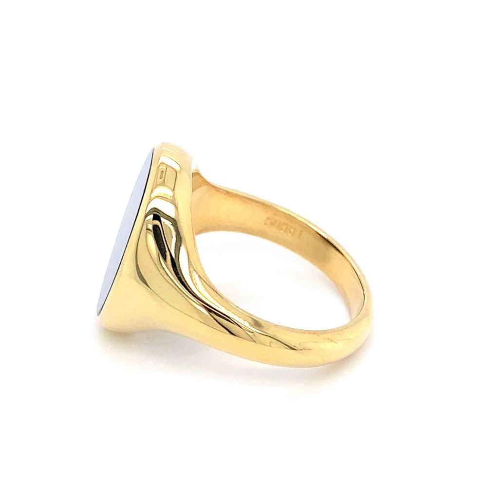 Siegelring aus Gelbgold mit ovalem und blauem Edelstein