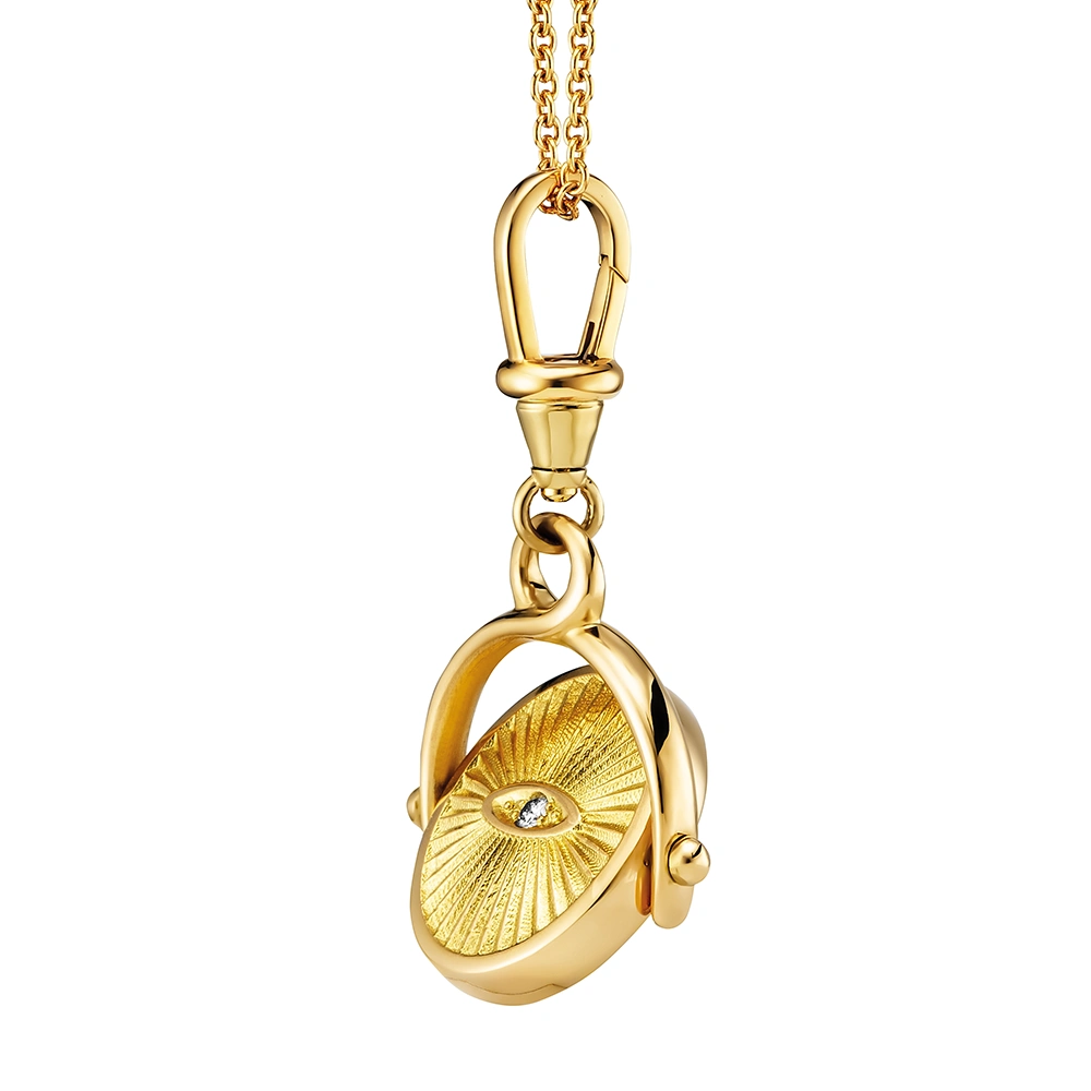 Oval swivel pendant necklace with layered onyx and diamond with decorated with shining engraving around it
