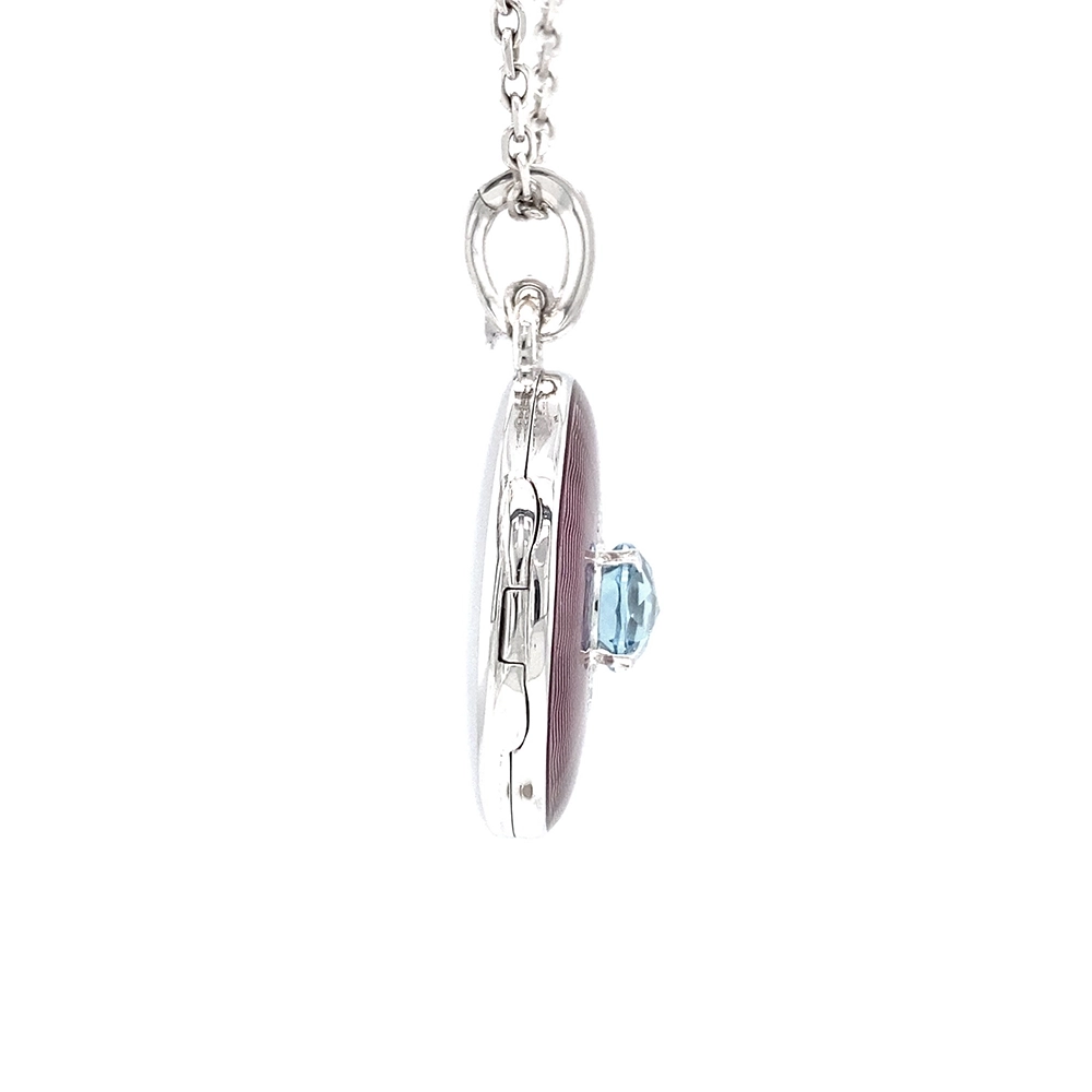 Ovaler Anhänger aus Weißgold, mit rosa Farbe, verziert mit Brillanten und einem blauen Edelstein