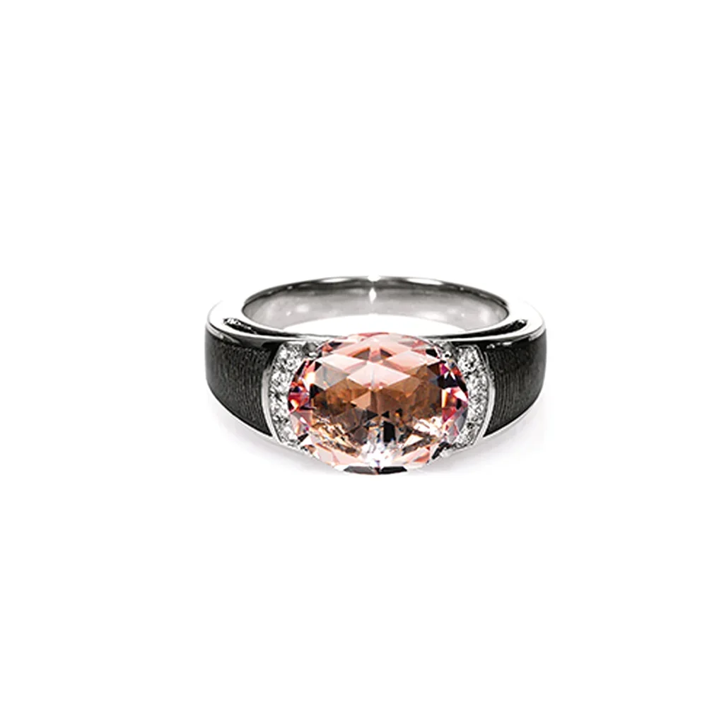 Ring aus Weißgold mit grauer Farbe verziert mit Brillanten und einem rosa Edelstein