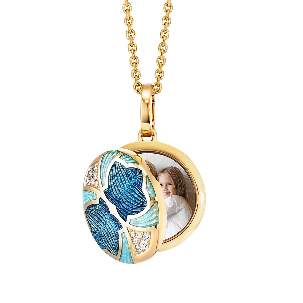 Medaillon aus Gelbgold blau gefärbt und verziert mit Brillanten