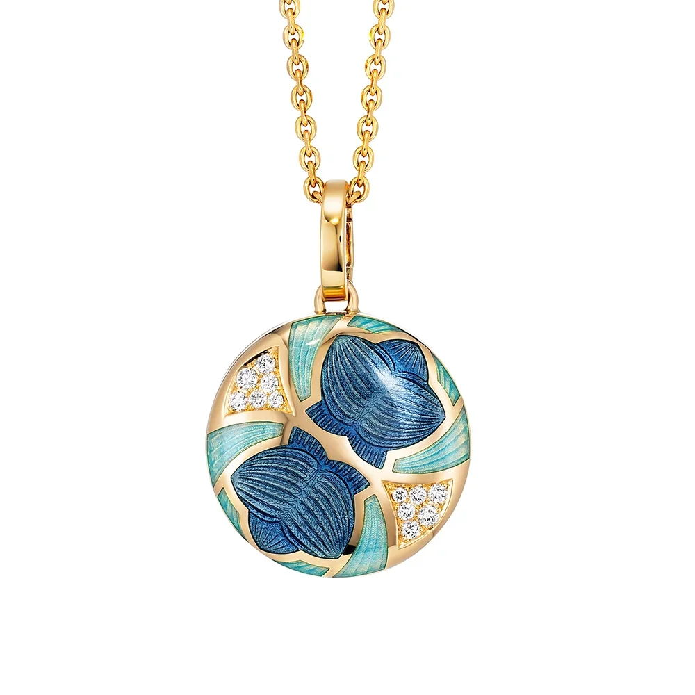Medaillon aus Gelbgold blau gefärbt und verziert mit Brillanten