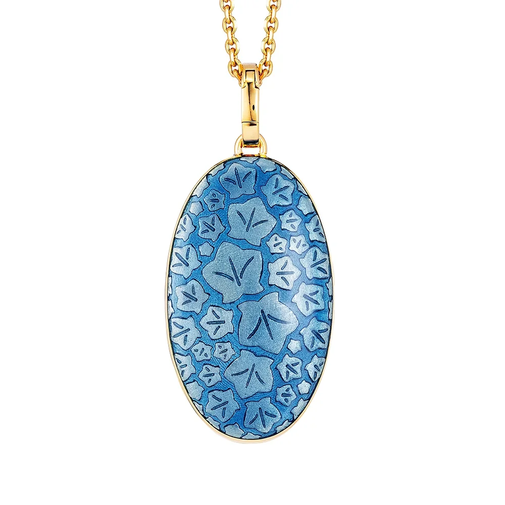Medaillon aus Gelbgold blau gefärbt und verziert mit einem Brillanten