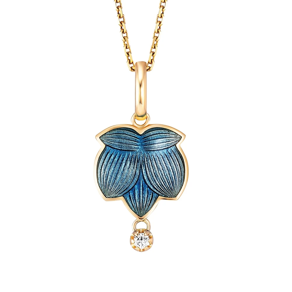 Anhänger aus Gelbgold blau gefärbt und verziert mit einem Brillant