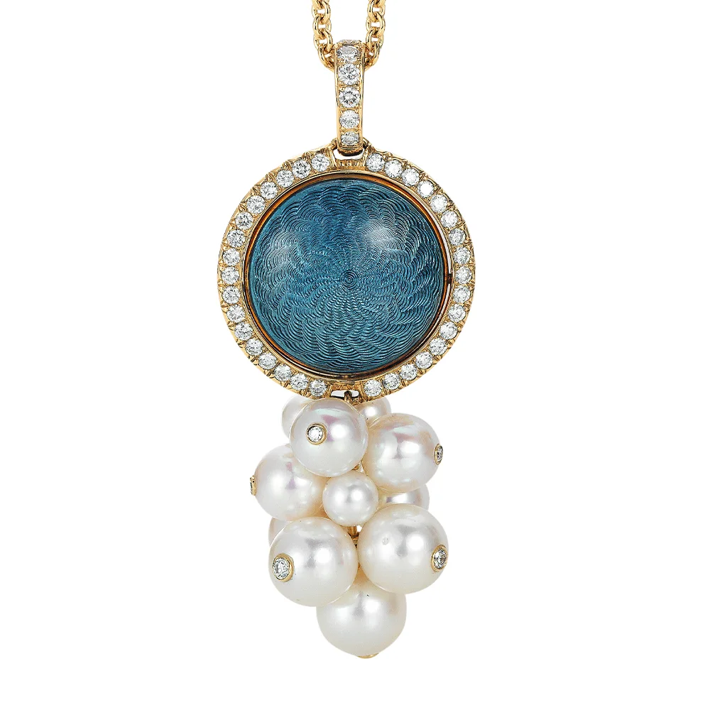 Swivel pendant Candy in yellow gold with a round 20.2 mm head, domed enamel surface in turquoise and blue over windmill guilloché, surrounded by 48 diamonds and decorated with a cluster of 9 Akoya cultured pearls, each set with a diamond.
