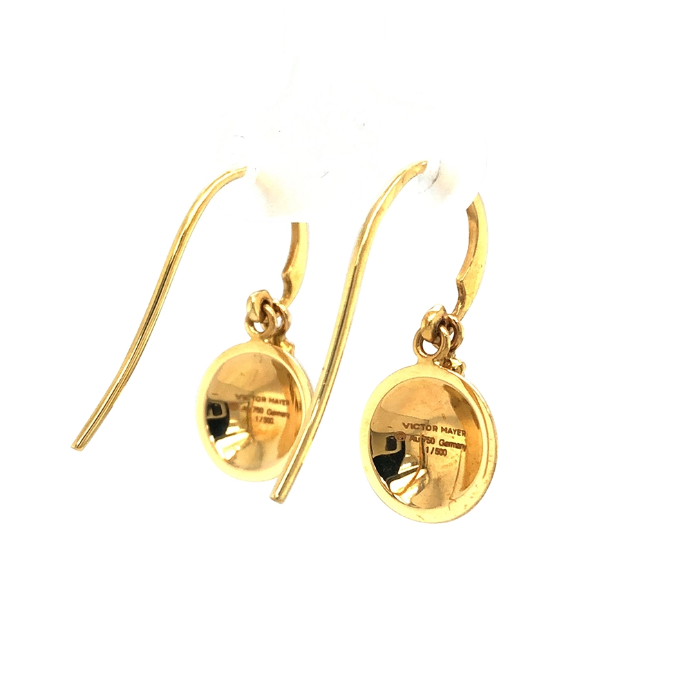 Round Candy ear hooks in yellow gold with medium blue enamel over windmill guilloché, two diamonds, one freely suspended from the hook fitting, diameter 10 mm.