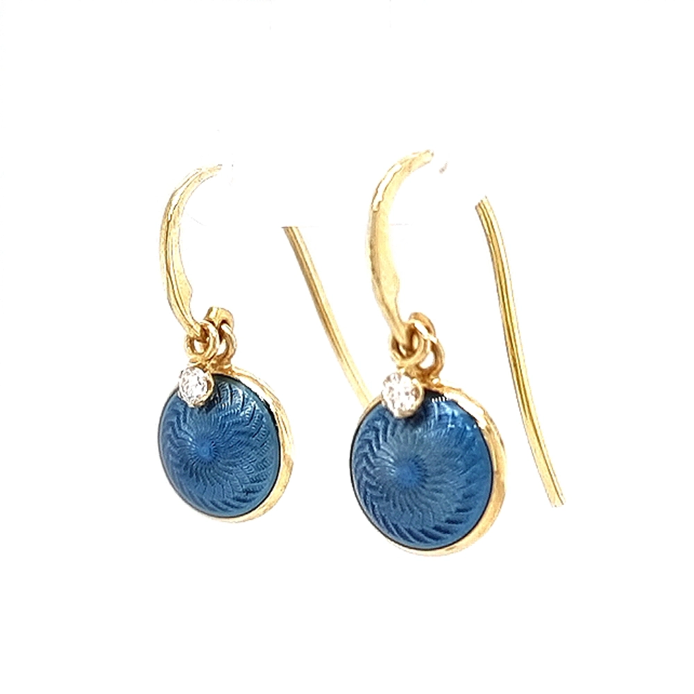Round Candy ear hooks in yellow gold with medium blue enamel over windmill guilloché, two diamonds, one freely suspended from the hook fitting, diameter 10 mm.
