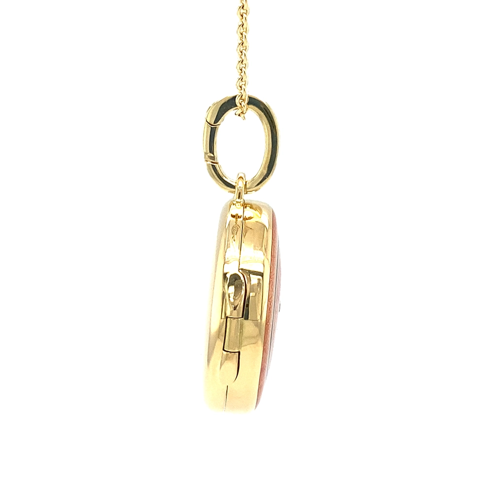 Round locket necklace in yellow gold, lacquered pink and set with a diamond