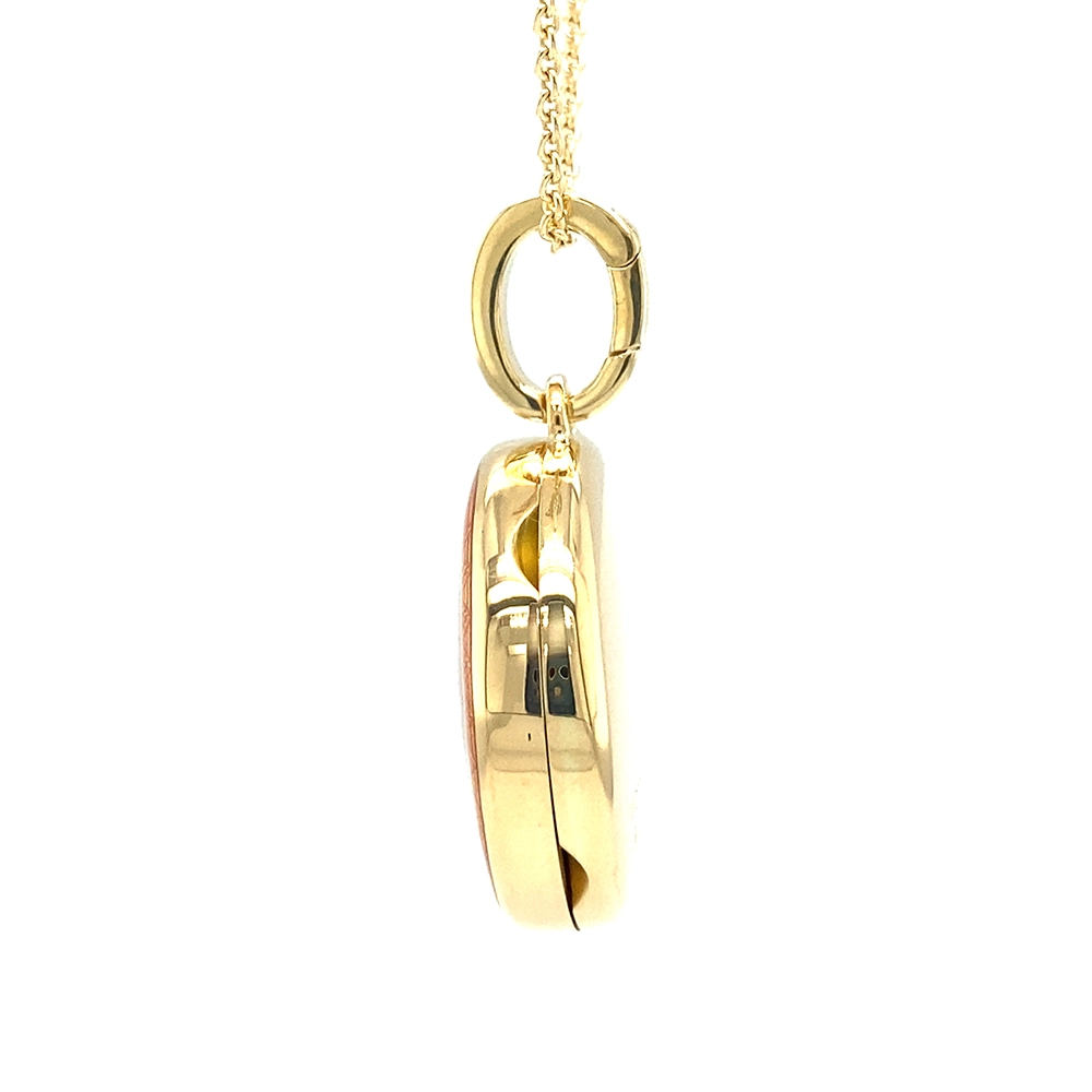 Round locket necklace in yellow gold, lacquered pink and set with a diamond