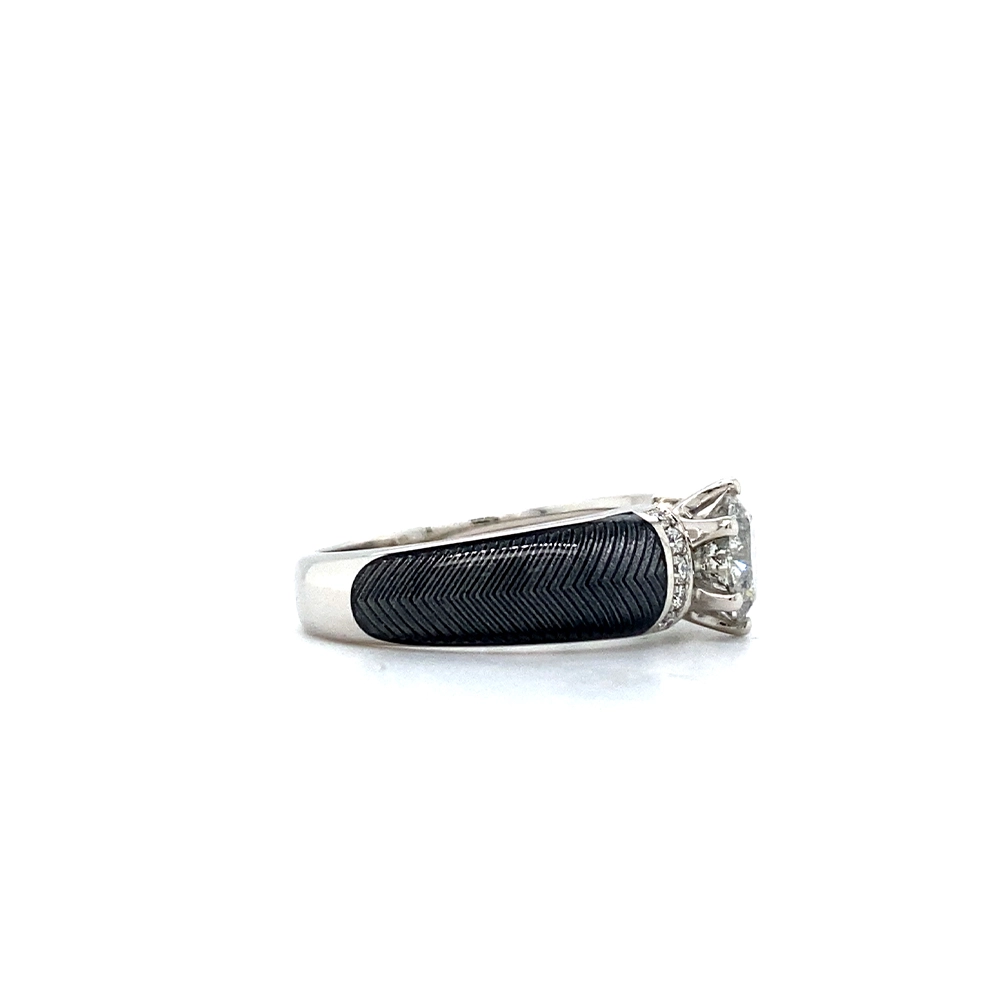 Golden ring with a white centre stone and two rows of small diamonds next to it. The ring shoulders are coloured grey.