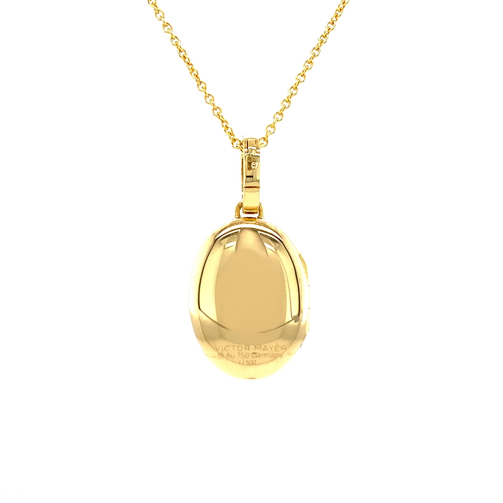 Ovaler Medaillon-Anhänger aus Gelbgold, blau lackiert mit einer vielzahl kleiner goldener Punkte und mit einem tropfenförmigen blauen Edelstein in der Mitte.