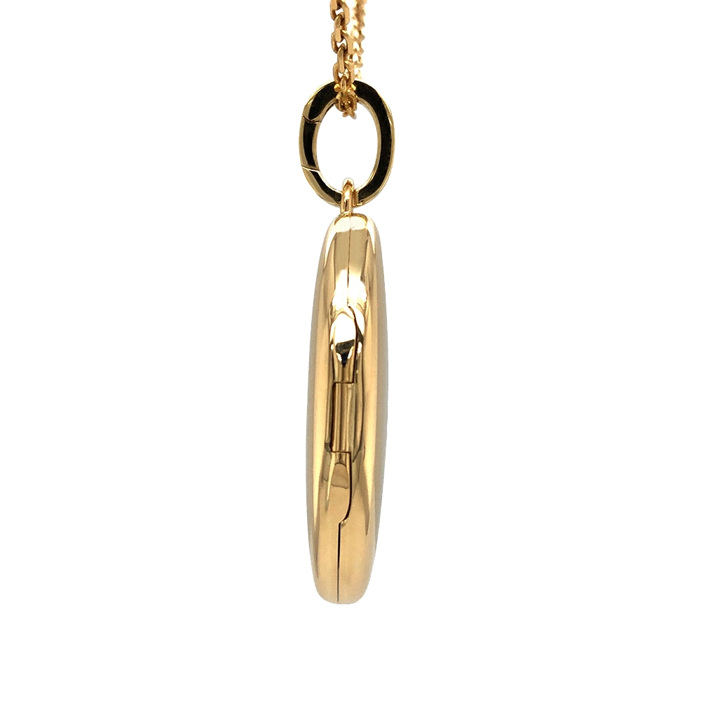 Ovaler Medaillon-Anhänger in Gelbgold mit sternförmig gefassten Brillanten.